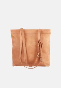 Tan leather tote bag with a smooth finish, featuring long straps, side accents, and a minimalist design. No visible hardware details.