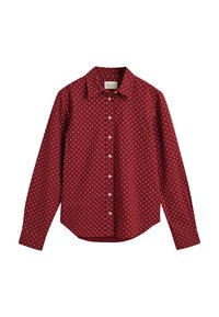 Chemise à manches longues boutonnée, rouge foncé avec des pois blancs et un col pointu, présentée sur fond blanc.