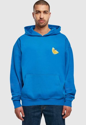 Blue cotton hoodie with a front pocket, drawstring hood, and a small, embroidered yellow citrus slice on the left chest.