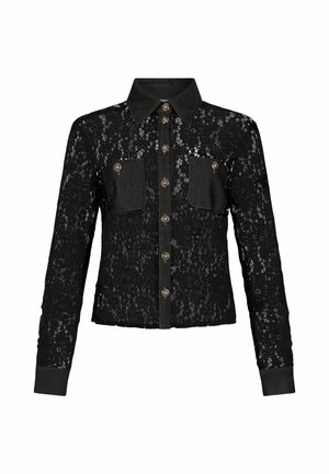 Camisetta nera in pizzo a maniche lunghe con dettagli in denim, dotata di due tasche sul petto e bottoni decorativi in tono oro lungo la parte frontale.