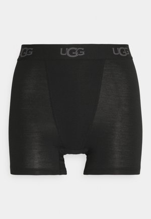 Sorte boxershorts laget av et mykt, stretchy stoff. Har en elastisk midjebånd med UGG-logo. Glatt tekstur og tett passform.