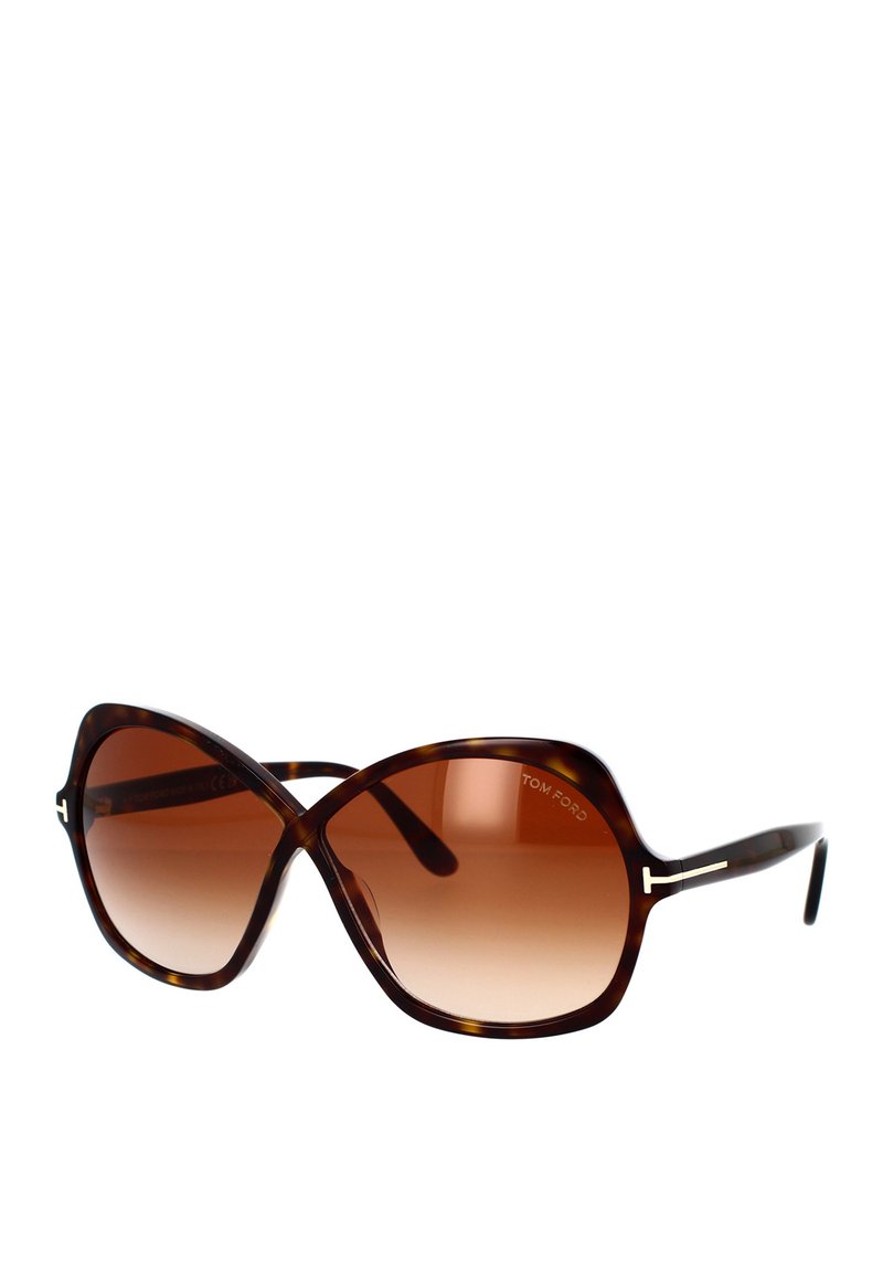 Occhiali da sole tartarugati dalla grande forma a farfalla. Lenti gradientate marroni e sottili accenti metallici sulle aste. Nome del marchio visibile.