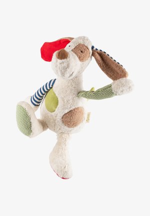 Plush dog toy with white, brown, red, green, and blue striped patches, one floppy ear, and a raised leg.