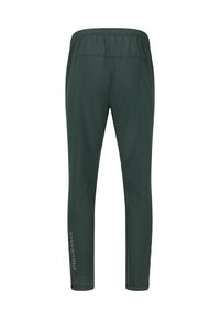 Donkergroene sportbroek met een elastische tailleband, smal model en reflecterende tekst "ENDURANCE" op het onderbeen. Zachte, lichtgewicht stof.