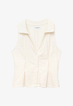 Bílý bezrukávový top s texturovaným vzorem, s límečkem a V-výstřihem vpředu. Obsahuje boční záhyby a mírně přiléhavý střih.