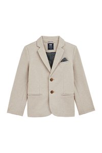 Kreminiai švarkas, pagamintas iš tekstūruotos medžiagos, su įstrižiais apykaklėmis, dviem mygtukais ir dviem priekinių kišenių. Pridedama raštuota nosinė kišenėje.