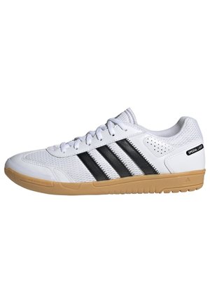 White athletic shoe with black stripes, mesh upper, rubber sole, and perforated accents. Features laces and "Special Light" detail on the side.