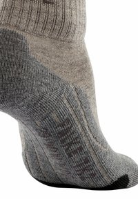 Calzino grigio e beige con motivo a maglia texture, tallone e punta rinforzati. Materiale morbido con risvolto a coste per una vestibilità e un comfort ottimali.