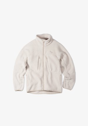 Fleecejacke in hellem Beige mit hohem Kragen, durchgehendem Reißverschluss und zwei Reißverschlusstaschen vorne. Verfügt über eine weiche Textur und dezentes Logo-Detail.