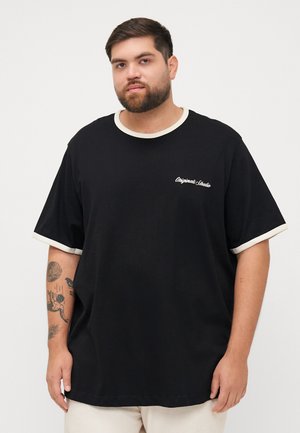 Black cotton t-shirt featuring short sleeves with cream-colored cuffs, a round neck, and white embroidered text on the chest.