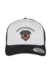 Fekete-fehér snapback sapka, amelyen egy nyitott szájú Rottweiler grafika látható. A dizájn felett íródott a "IGAZ TISZTELET" felirat.