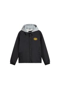 Giacca nera con cappuccio grigio, dotata di chiusura frontale a pressione e tasche laterali. Logo giallo "VANS" nella parte superiore sinistra del petto.