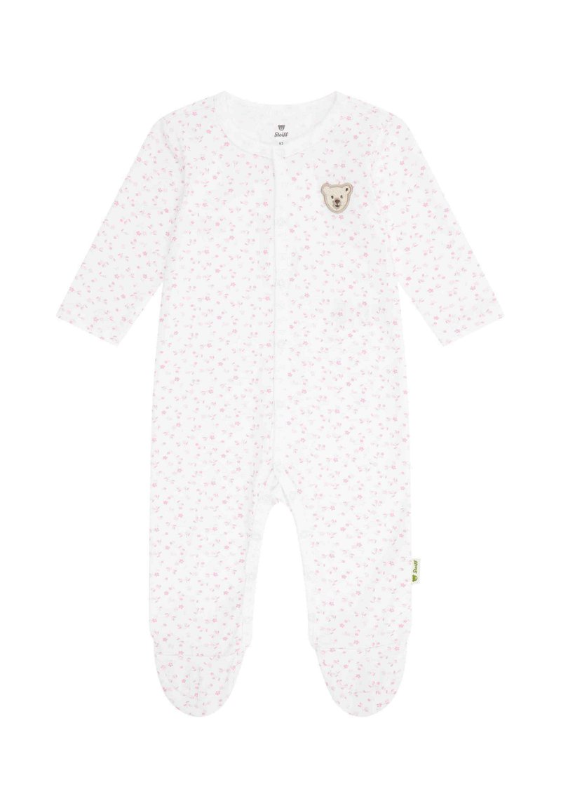 Weißer Babystrampler mit langen Ärmeln, ausgestattet mit einem pinken Blumenmuster und einem Bären-Patch auf der Brust. Enthält Druckknöpfe und bequeme Füßchen.