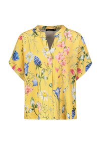 Gelbe Bluse mit kurzen Ärmeln, die ein florales Muster mit blauen, rosa und weißen Blumen aufweist. Mit Knopfleiste und einem geknöpften Kragen-Design.
