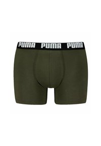 Boxer trunks da uomo color verde oliva con un elastico nero in vita che presenta il marchio Puma in bianco. Tessuto morbido e design aderente.