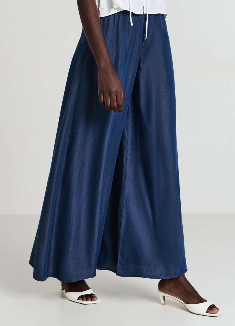 Calliope Jeans a zampa - blu denim scuro