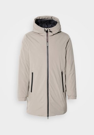 Light beige waterproof jacket, featuring a hood, front zipper, and two side pockets, made of smooth material with black accents.
