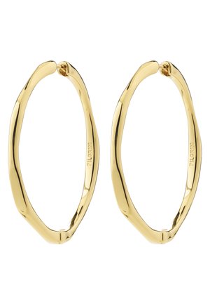 Pendientes de aro de forma oval irregular en tono dorado con acabado pulido y nombre de la marca sutilmente grabado en el interior.