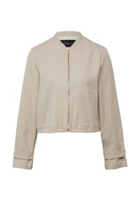 Veste courte beige en mélange de coton, avec un col montant, une fermeture éclair, deux poches avant et des détails de manches retroussées.