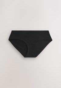 Sous-vêtement bikini taille basse noir sans couture, posé à plat sur une surface claire avec des détails de couture visibles.