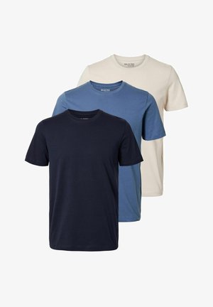 Set of three t-shirts: navy, blue, and cream. Short sleeves, round neck, soft cotton fabric. Simple design with no visible patterns or accents.