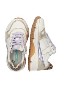 White sneakers with lavender accents, metallic gold details, and leopard print on the heel. Features a textured sole and lace-up design.