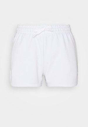 Białe bawełniane szorty z elastycznym pasem, wiązaniem i bez widocznych wzorów czy metalowych elementów. Prosty design i gładka tekstura.