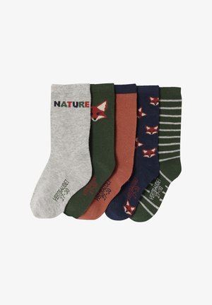 Five pairs of colorful socks with nature-themed designs, including fox faces, stripes, and the word "NATURE" on a gray pair.