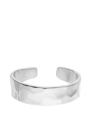 Wide, open-ended silver cuff bracelet with a slightly hammered, polished surface and smooth rounded edges.