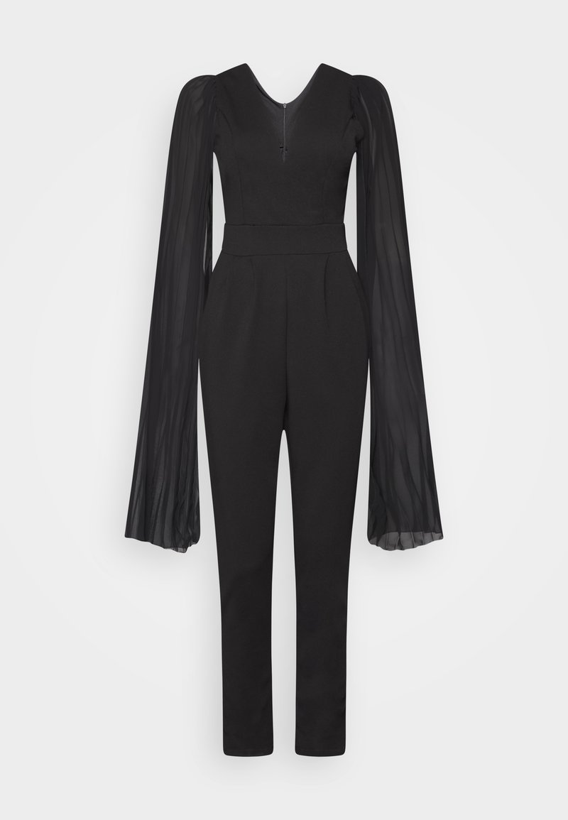 Combinaison noire à manches longues avec manches larges et fluides en tissu transparent, taille cintrée, jambes droites et fermeture éclair courte à l'encolure devant.