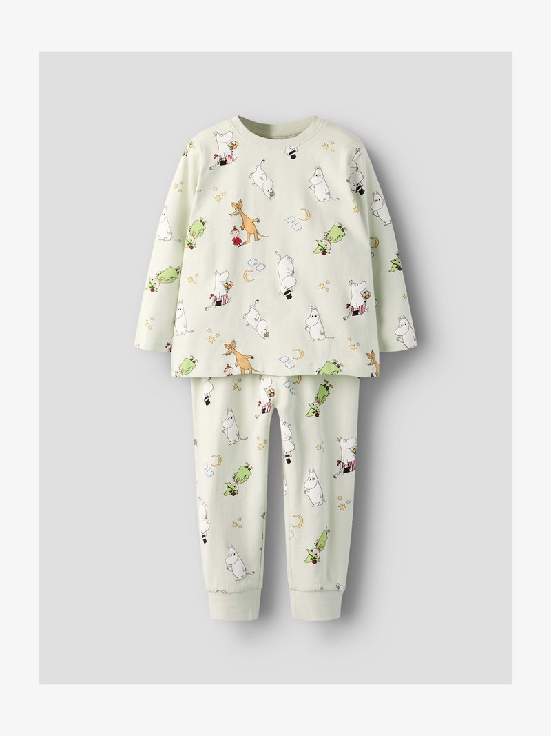Pyjama pour enfants à manches longues avec un fond crème, présentant des personnages de dessins animés, des étoiles, des lunes et de petits nuages répartis sur le tissu.