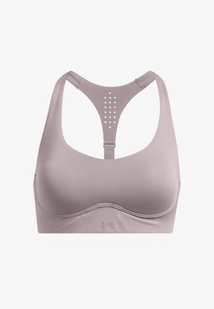 Lys lilla sportsbh i glat, strækbart stof. Racerback-design med små huller til ventilation. Logo-detalje under armen synlig.