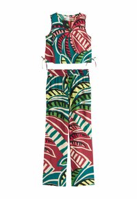 Ensemble composé d'un top court sans manches et d'un pantalon à jambes larges avec un motif abstrait coloré de feuilles et de rayures dans des tons rouges, verts, bleus et crème.