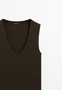 Sleeveless dark brown cotton tank top with deep V-neck and fine ribbed trim, labeled Massimo Dutti.