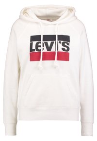 Sweat à capuche blanc avec une poche kangourou, arborant un logo "LEVI'S" noir et rouge audacieux sur la poitrine. Tissu en coton doux et coupe régulière.