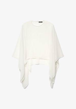 Weiße asymmetrische Bluse im Poncho-Stil mit weiten, fließenden Ärmeln und rundem Ausschnitt, vor weißem Hintergrund präsentiert.