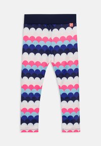 Des leggings avec une taille élastique bleu marine, présentant un motif en vagues colorées dans des teintes de rose, bleu et blanc sur un fond sombre.
