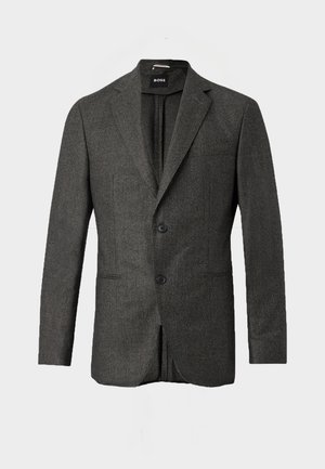Blazer pour homme gris foncé avec deux boutons à l'avant, revers crantés et poche poitrine, présenté sur un fond clair uni.
