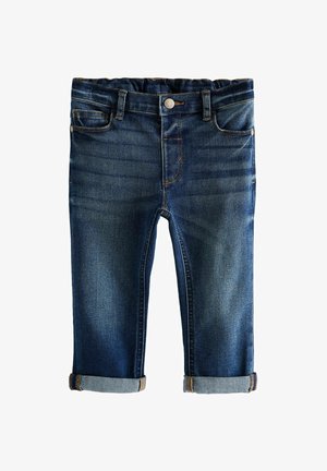 Jeans dżinsowe w ciemnoniebieskim kolorze z lekkim przetarciem, z pasem i zrolowanymi mankietami. Zawierają dwie przednie kieszenie i kieszonkę na monety.