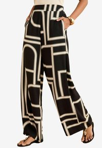 Nohavice - black white geo print