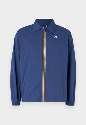 Navy blue lightweight jacket with a collared neck, front zipper featuring multicolored stripes, and elastic cuffs for a snug fit.