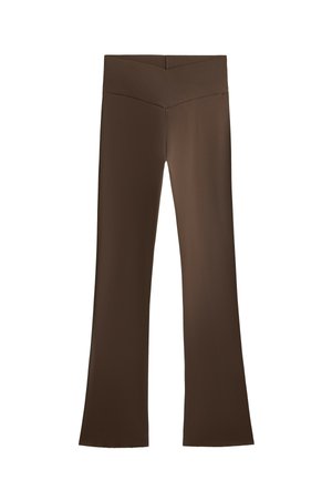 Pantaloni a zampa d'elefante marroni con una vita alta caratterizzati da un design incrociato. Realizzati in un materiale liscio e elasticizzato per comfort e vestibilità.