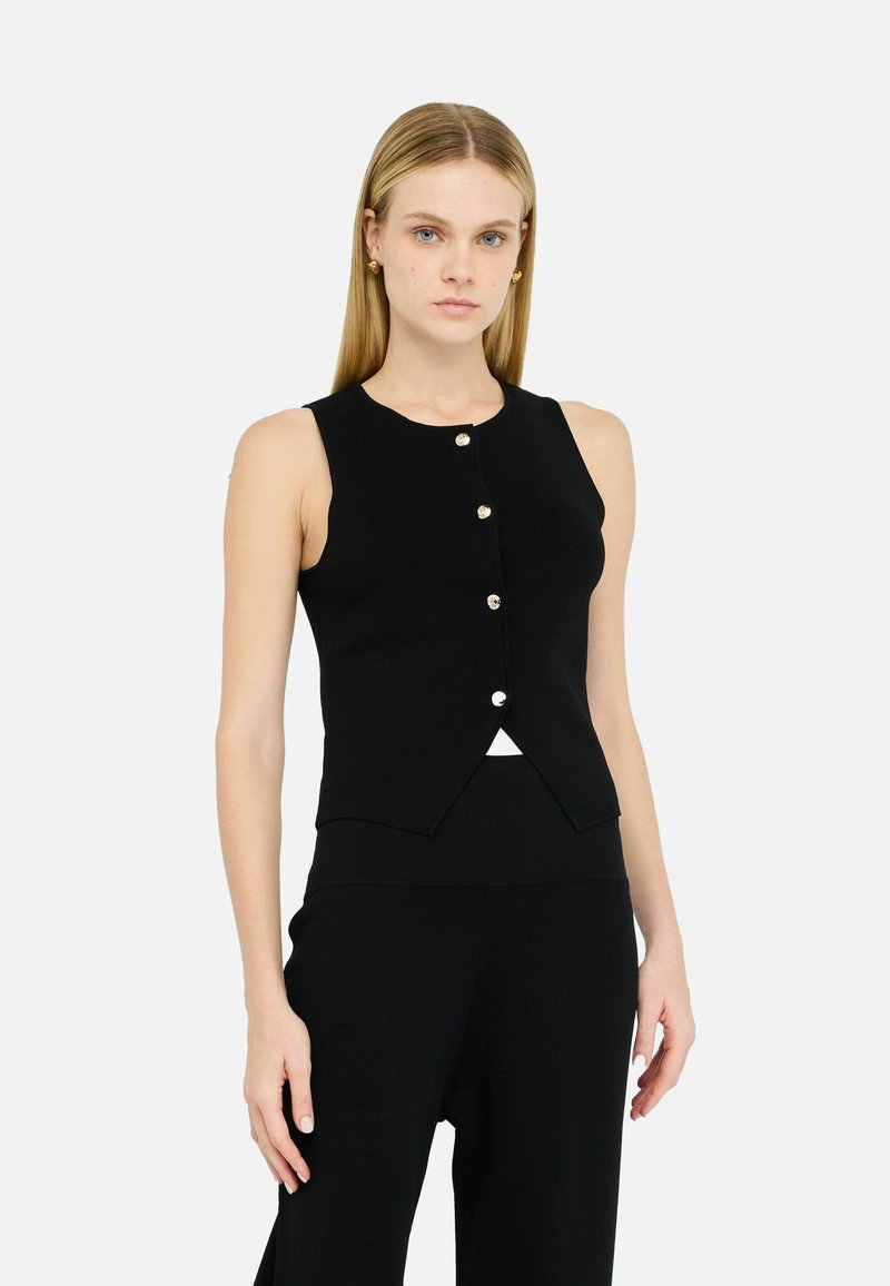 Black sleeveless top with a fitted design, v-shaped hem, and five front buttons. Made of smooth, stretchy fabric. No patterns.