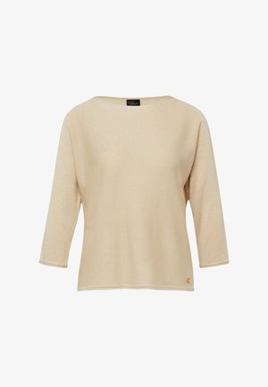 Beżowy, lekki sweter z długim rękawem, z dekoltem w łódkę, luźnym krojem i małym złotym logo na dolnym brzegu z przodu po prawej stronie.