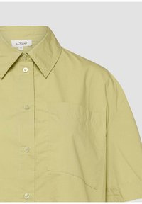 Chemise à manches courtes vert clair avec col et poche poitrine, étiquette s.Oliver, taille 36.