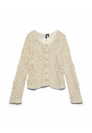 Cardigan à manches longues en crochet de couleur crème avec des motifs circulaires et ovales, boutonnière sur le devant et encolure arrondie.