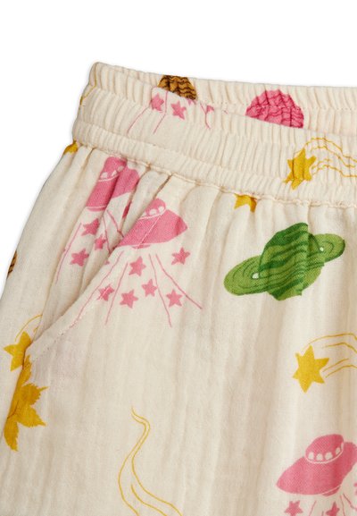 Κρεμ παντελόνι από ύφασμα με ελαστική μέση και διακοσμητικό μοτίβο ροζ UFO, πράσινων πλανητών και κίτρινων αστεριών.