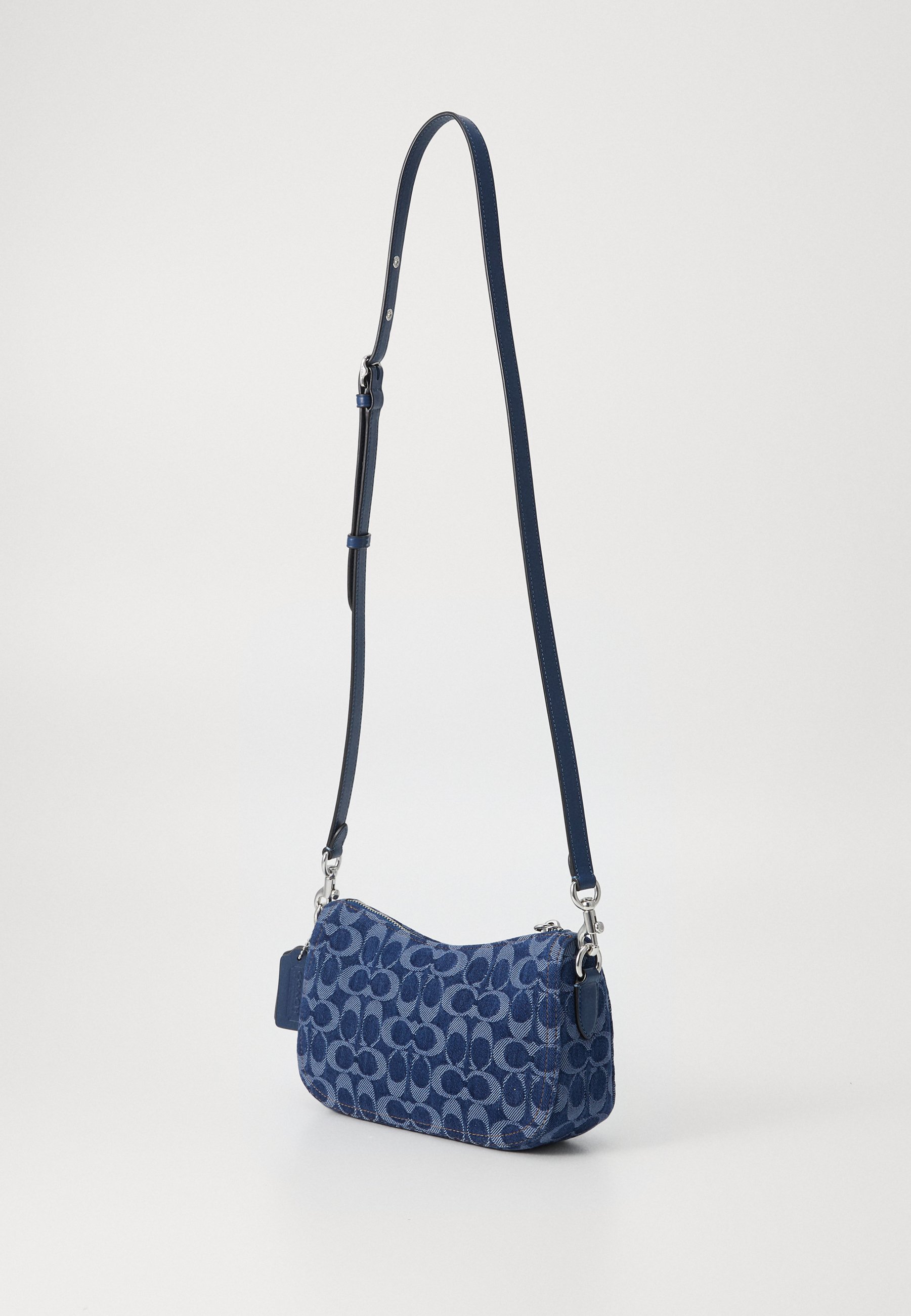 COACH SWINGER BAG IN SIGNATURE DENIM - Cross body bag - deep