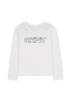 Chemise blanche à manches longues avec un col rond et un logo DKNY argenté brillant imprimé sur la poitrine.
