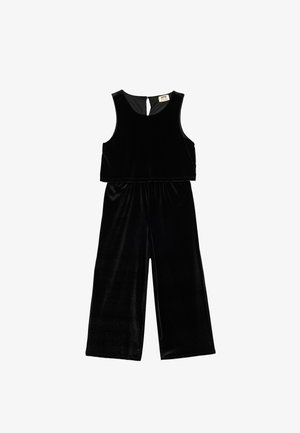 Sort fløjl jumpsuit med ærmeløs design og åbning i ryggen. Bredde flaired ben og glat, blød tekstur hele vejen igennem.